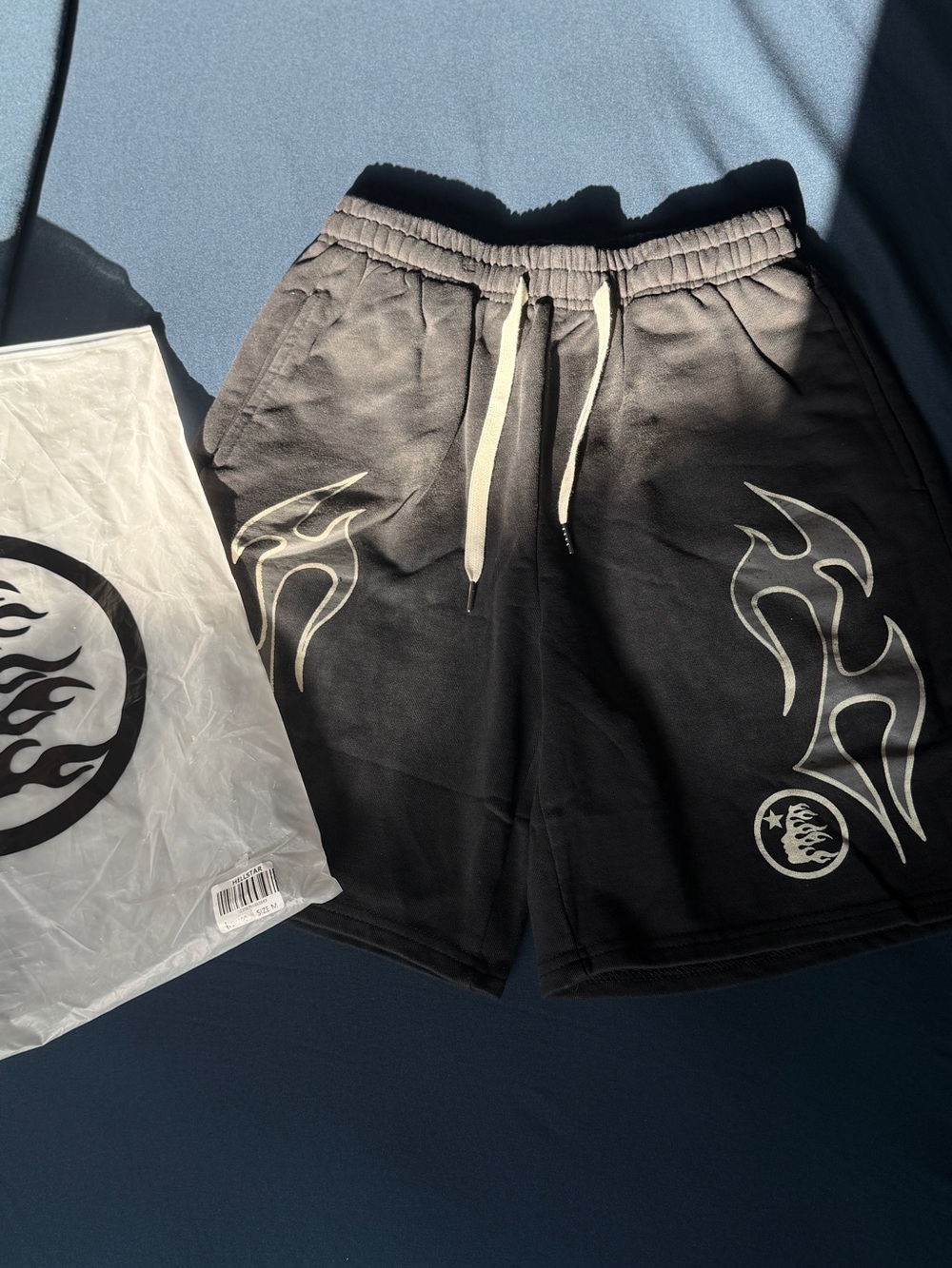 Hellstar Black Athletic Shorts with Cream Flame Accents